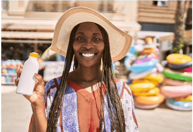 closeup shot of a woman wearing a hat